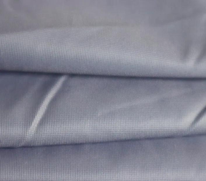 Medium-light grey random three-way fabric