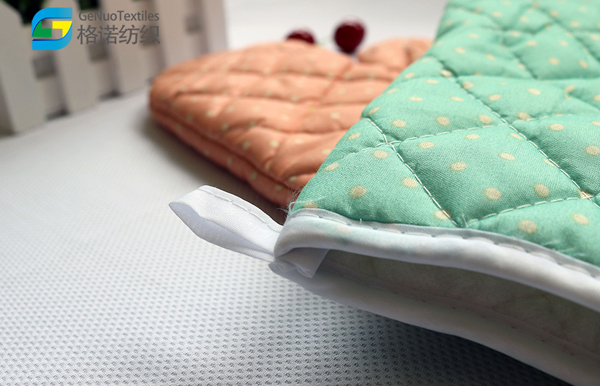 Pink, blue, and red microwave oven gloves