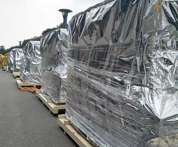 I. Special Requirements and Challenges of Packaging for Mechanical and Electrical Equipment Packaging for mechanical and electrical equipment faces multiple complex challenges. First, the precision of the equipment itself requires the packaging to provide adequate physical protection. Take motors as an example: they contain intricate winding and bearing systems, and vibrations and impacts during transportation can cause internal structural displacement or damage. Data shows that improper packaging accounts for over 35% of motor failures during transportation. Environmental factors also have a significant impact on mechanical and electrical equipment. Metal components are particularly sensitive to moisture; when relative humidity exceeds 60%, an electrolyte film begins to form on the metal surface, accelerating the electrochemical corrosion process. Motors containing copper windings and iron cores are especially prone to oxidation in humid environments, leading to decreased insulation performance. Temperature changes are equally important; drastic temperature fluctuations can cause condensation inside the equipment, potentially leading to serious problems such as short circuits. The diversity of mechanical and electrical equipment forms presents additional challenges for packaging design. From micro-control motors to large industrial pumps, the size of the equipment varies greatly, and their external structures are complex. Many devices also contain precision components such as external terminals and bearings, which are easily damaged during transportation. Furthermore, uneven weight distribution and center of gravity shifts in the equipment require careful consideration in packaging design. The challenges of long-term storage also necessitate professional solutions. Some electromechanical equipment may need to be stored for months or even longer, during which time the packaging must provide continuous and effective protection. Especially in complex environments such as port warehouses, the packaging needs to withstand various environmental factors, including diurnal temperature variations and seasonal humidity changes. II. Material Structure and Protection Mechanism The aluminized woven packaging bags for electromechanical equipment employ a composite layered structure design, with each layer optimized for specific protection needs. The base layer uses high-strength industrial-grade polypropylene woven fabric, whose warp and weft density is precisely calculated to ensure appropriate flexibility while bearing the weight of the equipment. For large equipment weighing over 50 kg, the woven fabric uses a double-layer reinforced structure with special reinforcement at the seams. The design of the functional layers reflects the scientific nature of the protection. The aluminum plating layer is formed through a vacuum evaporation process, with a thickness controlled between 500-700 angstroms. This thickness range has been extensively validated through experiments, achieving a balance between barrier performance and material flexibility. The surface of the aluminum plating layer undergoes nanoscale treatment to form a dense protective oxide film, further enhancing its corrosion resistance. Test data shows that the treated aluminum plating layer can withstand salt spray for over 800 hours. The rust prevention system is meticulously designed. Utilizing vapor phase rust prevention technology, the rust inhibitor slowly evaporates inside the packaging, creating a protective atmosphere. This rust prevention method is particularly suitable for complex electromechanical equipment, reaching internal spaces that are difficult to cover with traditional rust prevention methods. The selection of the rust inhibitor takes into account the characteristics of different metal materials, ensuring effective protection for various materials such as copper windings, iron cores, and aluminum shells. The cushioning system is designed with the characteristics of electromechanical equipment in mind. Elastic cushioning materials are incorporated into the inner layer of the packaging. These materials are custom-cut to fit the equipment's shape perfectly. The density of the cushioning material is precisely calculated to provide sufficient cushioning without causing excessive pressure on the equipment due to over-compression. III. Performance Characteristics and Technical Parameters Protective performance has undergone rigorous testing and verification. Moisture-proof performance tests show that in an environment with a temperature of 40℃ and a relative humidity of 90%, the internal humidity of the packaging can be stably maintained below 45%. This index is far below the critical humidity for metal corrosion, ensuring effective protection of the equipment even in harsh environments. Continuous monitoring data indicates that this moisture-proof effect can be maintained for more than 180 days. Rust-proof performance has been verified through multiple accelerated tests. In standard damp heat tests, the metal samples inside the packaging showed no signs of rust within 480 hours. Salt spray test results were equally satisfactory; under 5% sodium chloride solution spray conditions, the time to first rusting exceeded 360 hours. These data prove that the packaging can provide reliable long-term rust protection for electromechanical equipment. Excellent mechanical protection performance. Vibration tests simulate transportation environments, placing the packaged electromechanical equipment on a vibration table with a frequency of 5-100Hz for 72 hours continuously, and the internal structure of the equipment remained intact. Impact testing shows that the packaging effectively absorbs impact energy, controlling the impact acceleration transmitted to the equipment to below 15g, a value lower than the tolerance limit of most electromechanical equipment. High-standard sealing performance. Using helium mass spectrometry leak detection, the leakage rate of the packaging does not exceed 1×10⁻⁶ Pa·m³/s. This level of sealing performance ensures that moisture and contaminants from the external environment cannot enter the packaging, providing a clean and stable storage environment for the equipment. Long-term tracking data shows that the sealing performance remains stable over 6 months. IV. Production Process and Quality Control Strict standards are established for raw material inspection. Each batch of woven fabric undergoes 12 performance tests, including key indicators such as tensile strength, tear strength, and air permeability. Aluminum-coated film requires complete material certification, and its composition is verified through spectral analysis. Rust-proof materials must pass volatility and corrosion tests to ensure their safety and effectiveness. Refined control is achieved in the production process. The cutting process uses CNC equipment, automatically generating layout schemes based on the equipment's 3D data, achieving a material utilization rate of over 92%. The sewing process utilizes industrial-grade sewing equipment, with stitch density strictly controlled at 4-6 stitches per centimeter to ensure seam strength comparable to the material itself. The rust prevention treatment is particularly crucial. An automated spraying system is employed, precisely controlling the rust inhibitor application rate within the range of 15-20 g/m². Immediately after spraying, drying is performed with segmented temperature control: initial drying at 60℃, followed by curing at 45℃. This process ensures even distribution and strong adhesion of the rust inhibitor. Quality inspection is integrated throughout the entire production process. An online inspection system automatically scans each finished packaging bag, identifying any potential defects. Sampled products undergo destructive testing, including seam strength and sealing performance tests. All test data is automatically recorded, forming a complete quality archive. V. Application Practice and Case Analysis Industrial motor packaging is a typical application scenario. A well-known motor manufacturer exported large asynchronous motors using aluminized woven packaging bags. After 45 days of sea freight and multiple transshipments, unpacking and inspection revealed stable insulation resistance values and no signs of rust on the bearings. The vibration-damping design of the packaging effectively protects the precision internal structure of the motor. Pump equipment packaging demonstrates professional advantages. A batch of chemical process pumps used customized aluminized woven bags. The packaging was specially designed according to the irregular shape of the pump body, with reinforced protection for critical areas such as shaft extensions and flanges. Post-transport inspection showed that the equipment's sealing surfaces and precision-machined surfaces were intact and ready for direct installation and use. Packaging requirements for precision transmission equipment are even more stringent. A company's exported servo reducers used this packaging solution. The dry and clean environment maintained inside the packaging ensured that transmission accuracy was not affected. A specially designed cushioning system effectively absorbed the impact energy during transportation, protecting the precision gear transmission system. Power generation equipment packaging verifies protective effectiveness. A batch of diesel generator sets used aluminized woven bags for long-term storage. After 12 months, inspection showed that all metal surfaces of the equipment remained in their factory condition, and the electrical insulation performance showed no degradation. The packaging's durable protective capabilities save users significant maintenance costs. VI. Usage Specifications and Operating Guidelines Systematic preparation is required before packaging. First, the equipment must be thoroughly cleaned to remove oil, dust, and other contaminants. Use a specialized cleaning agent to treat metal surfaces, ensuring no fingerprints or sweat residue remain. After cleaning, allow it to dry completely; it is recommended to let it stand for 24 hours in an environment with a temperature of 25℃ and humidity below 40%. Meticulous equipment protection is essential. Use specialized protective covers to protect precision parts such as shaft extensions and keyways. Seal electrical connections such as terminals with insulating material. Determine lifting points based on the equipment's center of gravity to ensure even stress distribution during transportation. All protective measures must be clearly marked on the equipment drawings. The packaging process requires professional operation. First, lay the packaging bag flat on a clean platform and check the inner surface for damage. Use specialized equipment to gently place the product in, ensuring full contact between the cushioning material and the equipment surface. Avoid excessive force during sealing to prevent damage to the packaging material. Each operational step must be strictly followed according to the operating instructions. The sealing process must be precisely controlled. Adjust the heat-sealing parameters according to the ambient temperature, generally controlling them within the range of 160-180℃. After heat sealing, inspect the seal and use professional instruments to test the seal strength. It is recommended to apply protective tape to the sealed areas for extra protection. After sealing, allow the packaging to stand for 2 hours before handling. Storage and transportation require scientific planning. The warehouse environment should be well-ventilated and dry, with a recommended temperature range of -10℃ to 40℃ and relative humidity not exceeding 65%. Use dedicated pallets when stacking, and ensure the stacking height does not exceed the packaging design standards. Take rain protection measures during transportation and avoid prolonged direct sunlight. VII. Innovation, Development, and Future Trends Materials technology continues to advance. The application of new composite materials continuously improves the protective performance of packaging. Significant breakthroughs have been achieved in the research and development of smart materials, potentially leading to packaging solutions that can automatically adjust the internal environment. The development of environmentally friendly rust-proof materials is also attracting attention, and biodegradable packaging has entered the practical application stage. Detection technology is becoming increasingly sophisticated. The application of non-destructive testing technology enables real-time monitoring of the internal condition of packaging. The use of smart sensors makes environmental parameter monitoring more accurate. Big data analysis provides a scientific basis for packaging optimization. These technological innovations are driving the development of electromechanical equipment packaging towards a smarter and more reliable direction. Customized services are becoming a development trend. Personalized design based on 3D scanning is continuously improving the compatibility between packaging and equipment. The application of modular design concepts enhances packaging adaptability. The promotion of digital factory technology has significantly reduced the cost of small-batch customized production. Green manufacturing concepts are being implemented in practice. The use of recyclable materials continues to increase, and clean production processes are constantly being optimized. Packaging recycling solutions are becoming increasingly sophisticated, and life-cycle assessment has become an industry standard. These advancements are driving the sustainable development of the electromechanical equipment packaging industry. I. Special Requirements and Challenges of Packaging for Mechanical and Electrical Equipment Packaging for mechanical and electrical equipment faces multiple complex challenges. First, the precision of the equipment itself requires the packaging to provide adequate physical protection. Take motors as an example: they contain intricate winding and bearing systems, and vibrations and impacts during transportation can cause internal structural displacement or damage. Data shows that improper packaging accounts for over 35% of motor failures during transportation. Environmental factors also have a significant impact on mechanical and electrical equipment. Metal components are particularly sensitive to moisture; when relative humidity exceeds 60%, an electrolyte film begins to form on the metal surface, accelerating the electrochemical corrosion process. Motors containing copper windings and iron cores are especially prone to oxidation in humid environments, leading to decreased insulation performance. Temperature changes are equally important; drastic temperature fluctuations can cause condensation inside the equipment, potentially leading to serious problems such as short circuits. The diversity of mechanical and electrical equipment forms presents additional challenges for packaging design. From micro-control motors to large industrial pumps, the size of the equipment varies greatly, and their external structures are complex. Many devices also contain precision components such as external terminals and bearings, which are easily damaged during transportation. Furthermore, uneven weight distribution and center of gravity shifts in the equipment require careful consideration in packaging design. The challenges of long-term storage also necessitate professional solutions. Some electromechanical equipment may need to be stored for months or even longer, during which time the packaging must provide continuous and effective protection. Especially in complex environments such as port warehouses, the packaging needs to withstand various environmental factors, including diurnal temperature variations and seasonal humidity changes. II. Material Structure and Protection Mechanism The aluminized woven packaging bags for electromechanical equipment employ a composite layered structure design, with each layer optimized for specific protection needs. The base layer uses high-strength industrial-grade polypropylene woven fabric, whose warp and weft density is precisely calculated to ensure appropriate flexibility while bearing the weight of the equipment. For large equipment weighing over 50 kg, the woven fabric uses a double-layer reinforced structure with special reinforcement at the seams. The design of the functional layers reflects the scientific nature of the protection. The aluminum plating layer is formed through a vacuum evaporation process, with a thickness controlled between 500-700 angstroms. This thickness range has been extensively validated through experiments, achieving a balance between barrier performance and material flexibility. The surface of the aluminum plating layer undergoes nanoscale treatment to form a dense protective oxide film, further enhancing its corrosion resistance. Test data shows that the treated aluminum plating layer can withstand salt spray for over 800 hours. The rust prevention system is meticulously designed. Utilizing vapor phase rust prevention technology, the rust inhibitor slowly evaporates inside the packaging, creating a protective atmosphere. This rust prevention method is particularly suitable for complex electromechanical equipment, reaching internal spaces that are difficult to cover with traditional rust prevention methods. The selection of the rust inhibitor takes into account the characteristics of different metal materials, ensuring effective protection for various materials such as copper windings, iron cores, and aluminum shells. The cushioning system is designed with the characteristics of electromechanical equipment in mind. Elastic cushioning materials are incorporated into the inner layer of the packaging. These materials are custom-cut to fit the equipment's shape perfectly. The density of the cushioning material is precisely calculated to provide sufficient cushioning without causing excessive pressure on the equipment due to over-compression. III. Performance Characteristics and Technical Parameters Protective performance has undergone rigorous testing and verification. Moisture-proof performance tests show that in an environment with a temperature of 40℃ and a relative humidity of 90%, the internal humidity of the packaging can be stably maintained below 45%. This index is far below the critical humidity for metal corrosion, ensuring effective protection of the equipment even in harsh environments. Continuous monitoring data indicates that this moisture-proof effect can be maintained for more than 180 days. Rust-proof performance has been verified through multiple accelerated tests. In standard damp heat tests, the metal samples inside the packaging showed no signs of rust within 480 hours. Salt spray test results were equally satisfactory; under 5% sodium chloride solution spray conditions, the time to first rusting exceeded 360 hours. These data prove that the packaging can provide reliable long-term rust protection for electromechanical equipment. Excellent mechanical protection performance. Vibration tests simulate transportation environments, placing the packaged electromechanical equipment on a vibration table with a frequency of 5-100Hz for 72 hours continuously, and the internal structure of the equipment remained intact. Impact testing shows that the packaging effectively absorbs impact energy, controlling the impact acceleration transmitted to the equipment to below 15g, a value lower than the tolerance limit of most electromechanical equipment. High-standard sealing performance. Using helium mass spectrometry leak detection, the leakage rate of the packaging does not exceed 1×10⁻⁶ Pa·m³/s. This level of sealing performance ensures that moisture and contaminants from the external environment cannot enter the packaging, providing a clean and stable storage environment for the equipment. Long-term tracking data shows that the sealing performance remains stable over 6 months. IV. Production Process and Quality Control Strict standards are established for raw material inspection. Each batch of woven fabric undergoes 12 performance tests, including key indicators such as tensile strength, tear strength, and air permeability. Aluminum-coated film requires complete material certification, and its composition is verified through spectral analysis. Rust-proof materials must pass volatility and corrosion tests to ensure their safety and effectiveness. Refined control is achieved in the production process. The cutting process uses CNC equipment, automatically generating layout schemes based on the equipment's 3D data, achieving a material utilization rate of over 92%. The sewing process utilizes industrial-grade sewing equipment, with stitch density strictly controlled at 4-6 stitches per centimeter to ensure seam strength comparable to the material itself. The rust prevention treatment is particularly crucial. An automated spraying system is employed, precisely controlling the rust inhibitor application rate within the range of 15-20 g/m². Immediately after spraying, drying is performed with segmented temperature control: initial drying at 60℃, followed by curing at 45℃. This process ensures even distribution and strong adhesion of the rust inhibitor. Quality inspection is integrated throughout the entire production process. An online inspection system automatically scans each finished packaging bag, identifying any potential defects. Sampled products undergo destructive testing, including seam strength and sealing performance tests. All test data is automatically recorded, forming a complete quality archive. V. Application Practice and Case Analysis Industrial motor packaging is a typical application scenario. A well-known motor manufacturer exported large asynchronous motors using aluminized woven packaging bags. After 45 days of sea freight and multiple transshipments, unpacking and inspection revealed stable insulation resistance values and no signs of rust on the bearings. The vibration-damping design of the packaging effectively protects the precision internal structure of the motor. Pump equipment packaging demonstrates professional advantages. A batch of chemical process pumps used customized aluminized woven bags. The packaging was specially designed according to the irregular shape of the pump body, with reinforced protection for critical areas such as shaft extensions and flanges. Post-transport inspection showed that the equipment's sealing surfaces and precision-machined surfaces were intact and ready for direct installation and use. Packaging requirements for precision transmission equipment are even more stringent. A company's exported servo reducers used this packaging solution. The dry and clean environment maintained inside the packaging ensured that transmission accuracy was not affected. A specially designed cushioning system effectively absorbed the impact energy during transportation, protecting the precision gear transmission system. Power generation equipment packaging verifies protective effectiveness. A batch of diesel generator sets used aluminized woven bags for long-term storage. After 12 months, inspection showed that all metal surfaces of the equipment remained in their factory condition, and the electrical insulation performance showed no degradation. The packaging's durable protective capabilities save users significant maintenance costs. VI. Usage Specifications and Operating Guidelines Systematic preparation is required before packaging. First, the equipment must be thoroughly cleaned to remove oil, dust, and other contaminants. Use a specialized cleaning agent to treat metal surfaces, ensuring no fingerprints or sweat residue remain. After cleaning, allow it to dry completely; it is recommended to let it stand for 24 hours in an environment with a temperature of 25℃ and humidity below 40%. Meticulous equipment protection is essential. Use specialized protective covers to protect precision parts such as shaft extensions and keyways. Seal electrical connections such as terminals with insulating material. Determine lifting points based on the equipment's center of gravity to ensure even stress distribution during transportation. All protective measures must be clearly marked on the equipment drawings. The packaging process requires professional operation. First, lay the packaging bag flat on a clean platform and check the inner surface for damage. Use specialized equipment to gently place the product in, ensuring full contact between the cushioning material and the equipment surface. Avoid excessive force during sealing to prevent damage to the packaging material. Each operational step must be strictly followed according to the operating instructions. The sealing process must be precisely controlled. Adjust the heat-sealing parameters according to the ambient temperature, generally controlling them within the range of 160-180℃. After heat sealing, inspect the seal and use professional instruments to test the seal strength. It is recommended to apply protective tape to the sealed areas for extra protection. After sealing, allow the packaging to stand for 2 hours before handling. Storage and transportation require scientific planning. The warehouse environment should be well-ventilated and dry, with a recommended temperature range of -10℃ to 40℃ and relative humidity not exceeding 65%. Use dedicated pallets when stacking, and ensure the stacking height does not exceed the packaging design standards. Take rain protection measures during transportation and avoid prolonged direct sunlight. VII. Innovation, Development, and Future Trends Materials technology continues to advance. The application of new composite materials continuously improves the protective performance of packaging. Significant breakthroughs have been achieved in the research and development of smart materials, potentially leading to packaging solutions that can automatically adjust the internal environment. The development of environmentally friendly rust-proof materials is also attracting attention, and biodegradable packaging has entered the practical application stage. Detection technology is becoming increasingly sophisticated. The application of non-destructive testing technology enables real-time monitoring of the internal condition of packaging. The use of smart sensors makes environmental parameter monitoring more accurate. Big data analysis provides a scientific basis for packaging optimization. These technological innovations are driving the development of electromechanical equipment packaging towards a smarter and more reliable direction. Customized services are becoming a development trend. Personalized design based on 3D scanning is continuously improving the compatibility between packaging and equipment. The application of modular design concepts enhances packaging adaptability. The promotion of digital factory technology has significantly reduced the cost of small-batch customized production. Green manufacturing concepts are being implemented in practice. The use of recyclable materials continues to increase, and clean production processes are constantly being optimized. Packaging recycling solutions are becoming increasingly sophisticated, and life-cycle assessment has become an industry standard. These advancements are driving the sustainable development of the electromechanical equipment packaging industry.