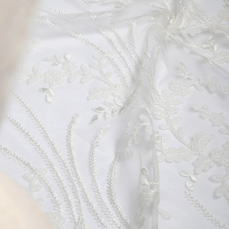 How to choose the suitable style and color of Lace fabric for wedding dress?