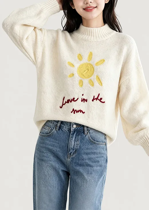 Soft loose mock neck knit sweater, handmade sun & letter embroidery, cozy relaxed fit everyday knitwear.