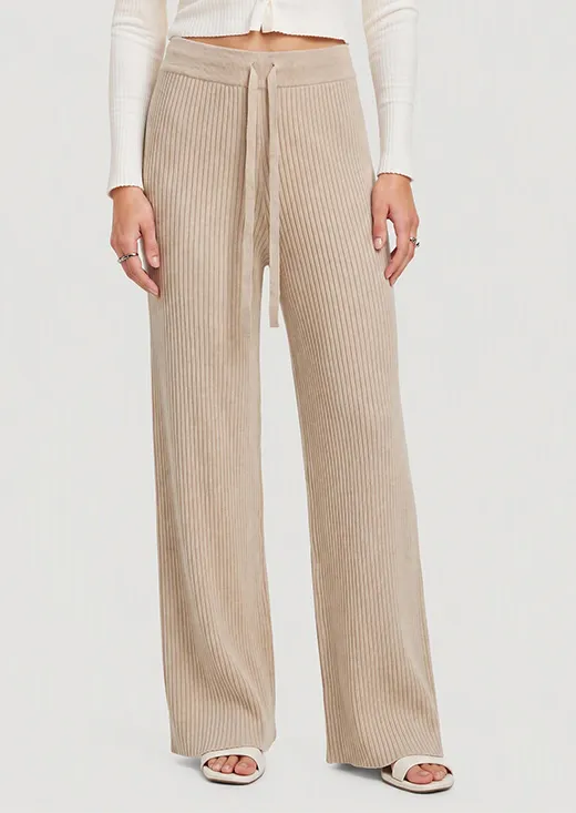 Aprikosenfarbene, gerippte Strickhose mit Kordelzug und weitem Bein