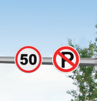 Speed limit and regulatory signs mounted on smart traffic pole