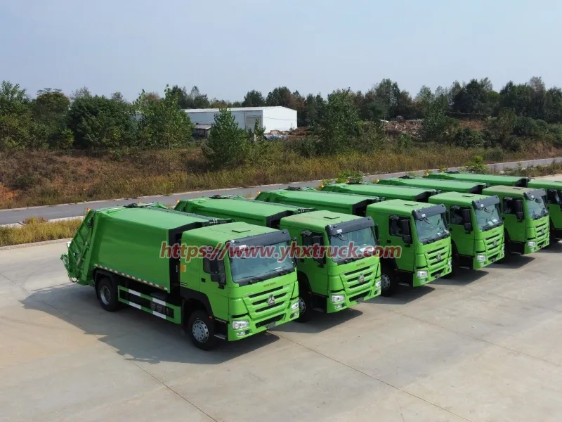 SINOTRUK 12m&sup3; Compactor Garbage Trucks Shipped to Angola for Sanitation Upgrade