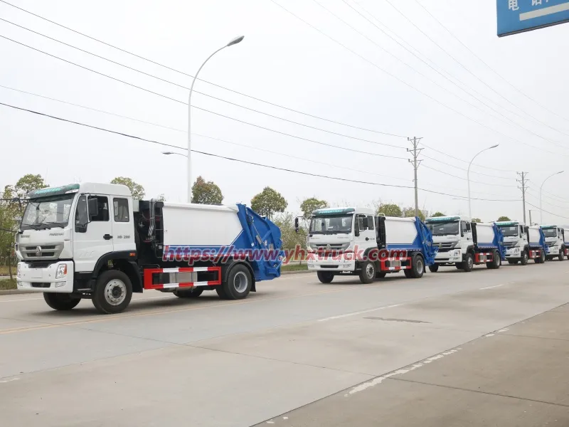 Five SINOTRUK 10m&sup3; Compactor Garbage Trucks Exported to Chile