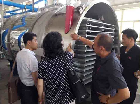 North Korean customers inspecting equipment at our company