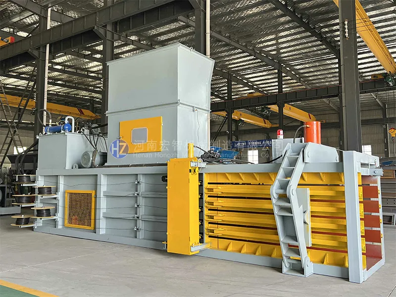 Horizontal hydraulic baler