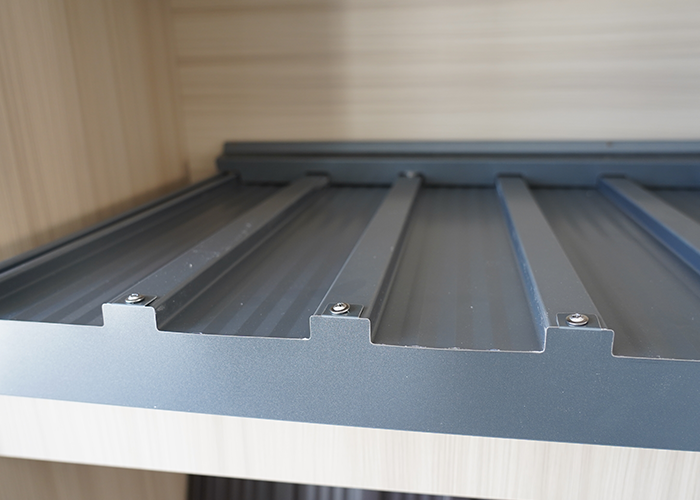 Waterproof and heat-insulating aluminum tiles