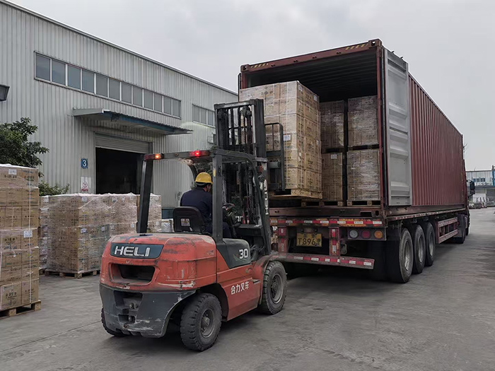Palletized cat litter products ready for export shipping.jpg