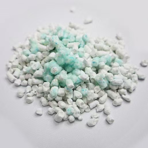Paper cat litter pellets made from processed paper fibers