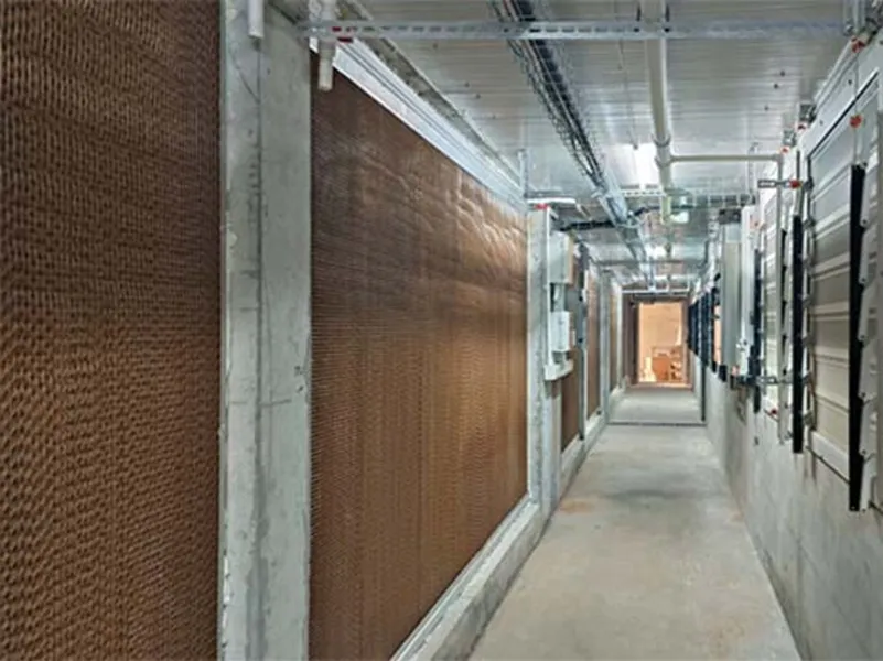 Livestock evaporative cooling pad wall system