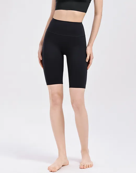 Shorts deportivos de compresi&oacute;n a mitad de la mitad de la mujer