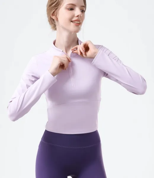 Top de yoga de manga larga activa para mujeres