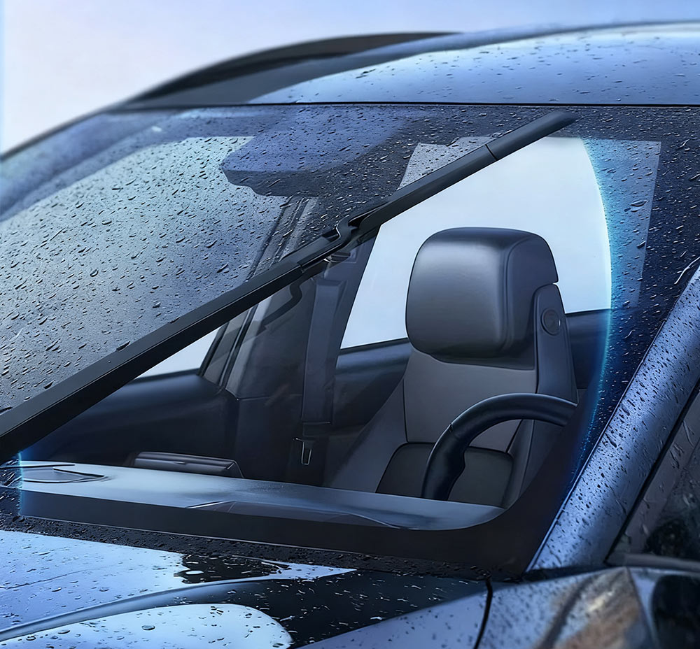 car windshield wiper clearing rain on wet road for safe driving