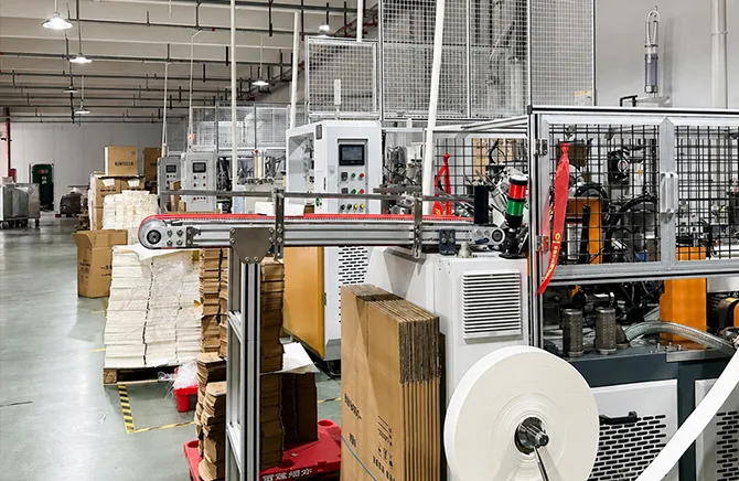 Paper packaging production equipment and paper rolls in the factory