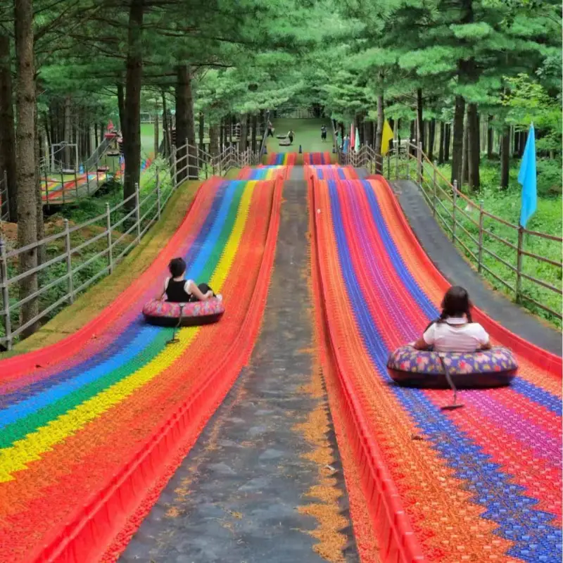 China Supplies Outdoor Parent-child Interaction to Play with Dry Polymer Particles rainbow Slides for Sale