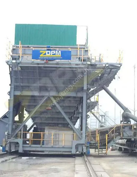 Port track dust removal hopper